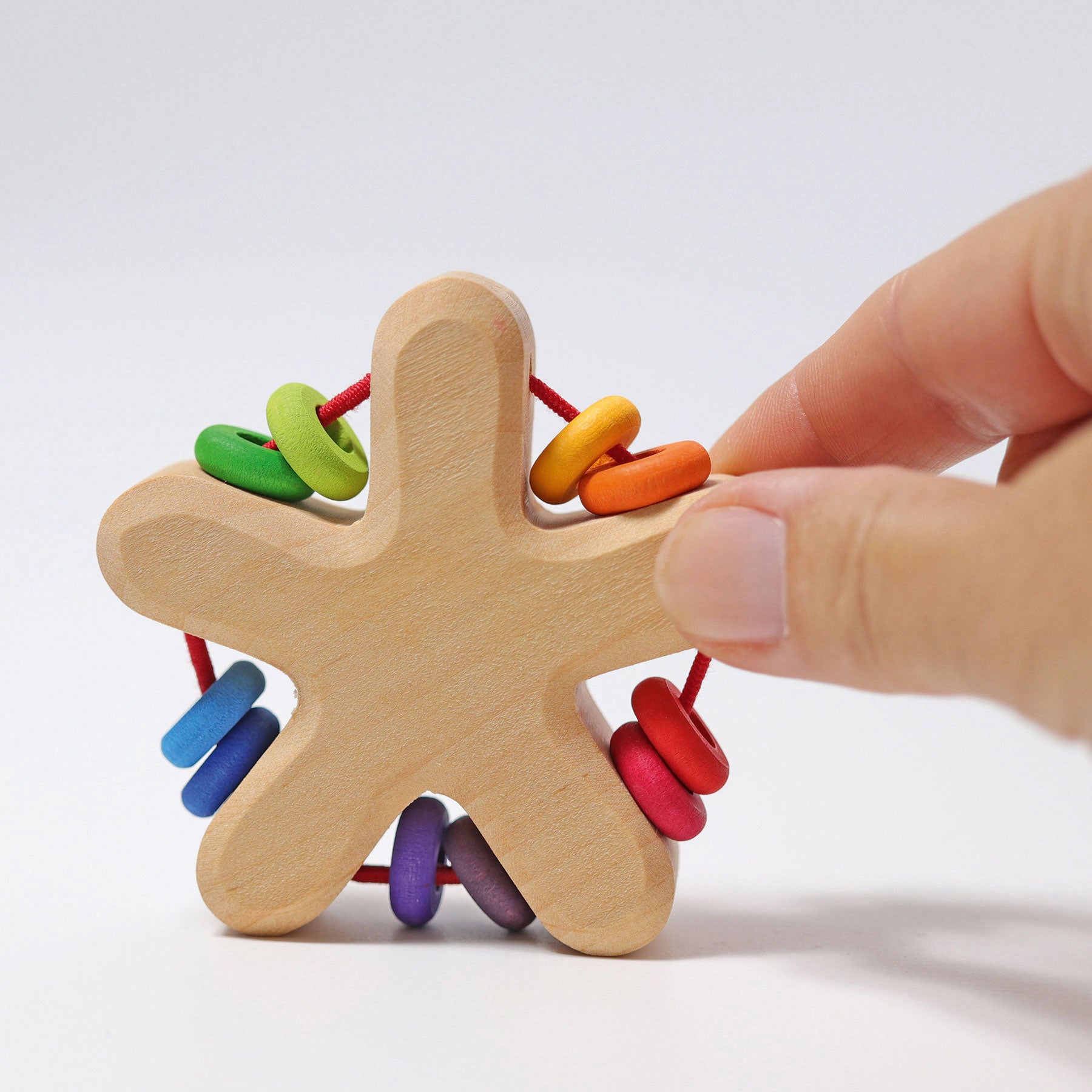 Rasseln GRIMM'S Spiel und Holz Design Regenbogen Stern