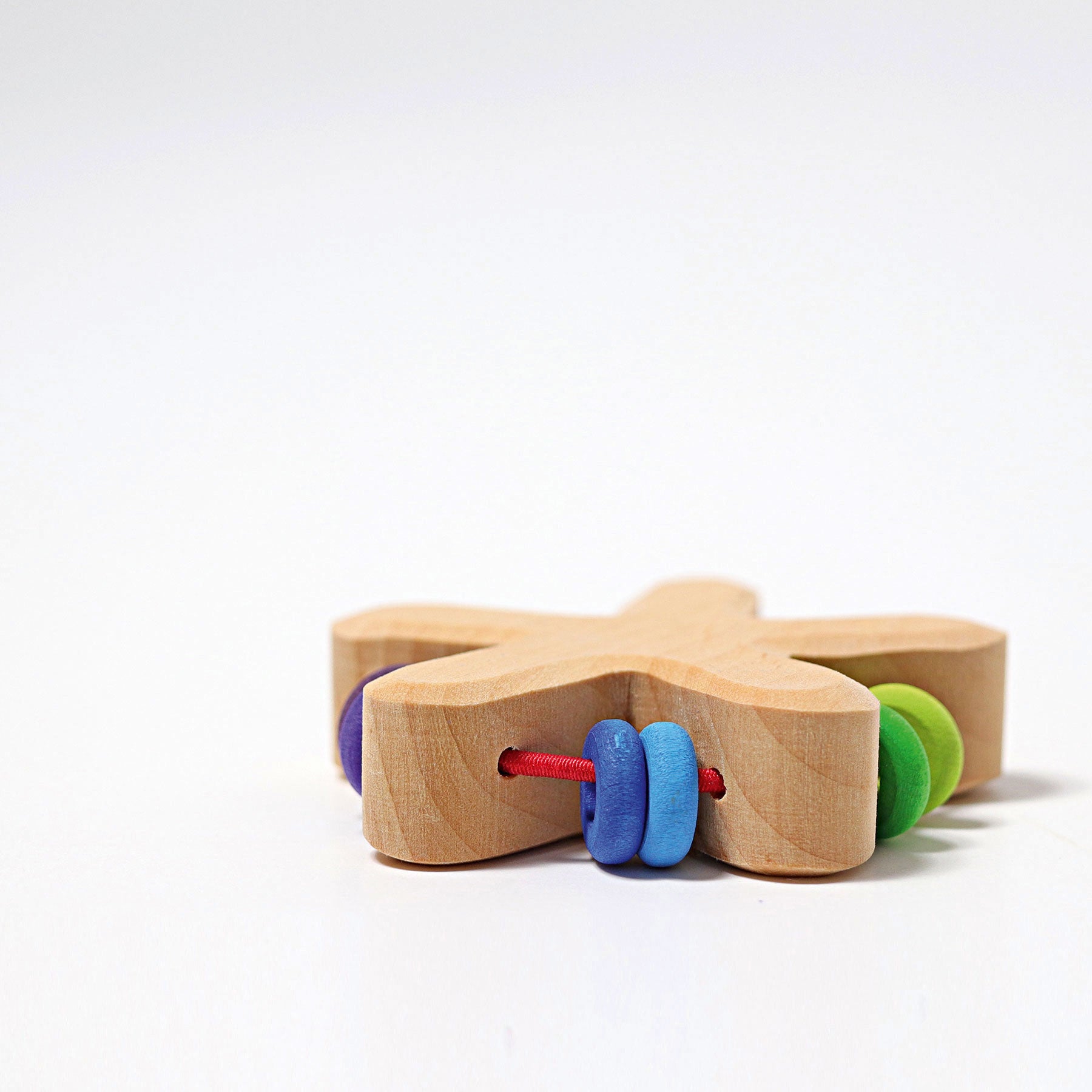 Rasseln GRIMM'S Spiel und Holz Design Regenbogen Stern